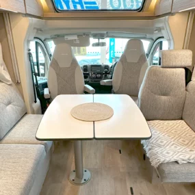 Burstner Campeo TD 736 G Motorhome Lounge Area with table extended