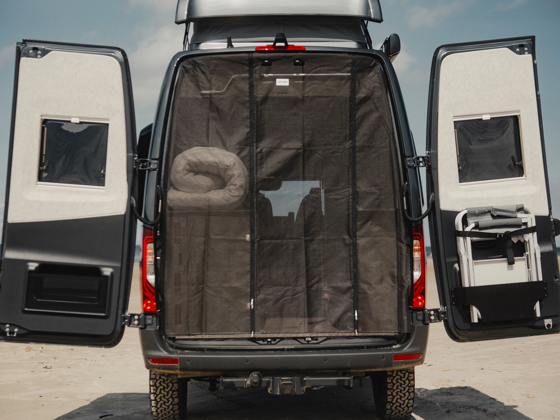 Hymer Grand Canyon S Crossover Campervan - Exterior Rear Open Flyscreen