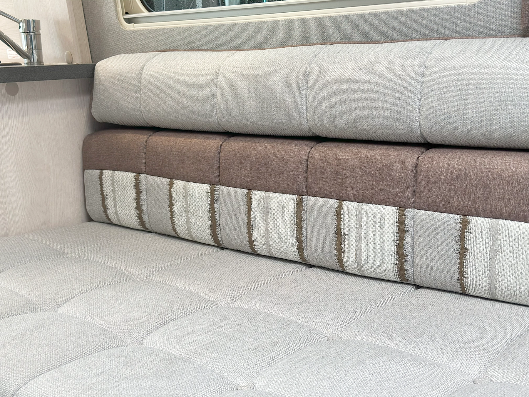 Auto-Sleeper Warwick TV in Rear Lounge Bench Fabric